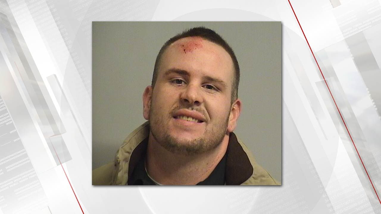 Driver With Vodka In Car Crashes Into Patrol Car, Tulsa Police Say
