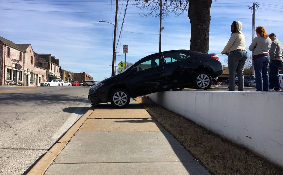 Company Car Goes Off Ledge On Tulsa's Cherry Street