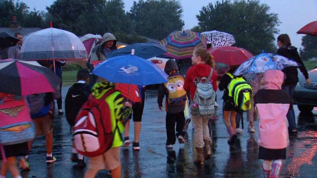 Despite Rain, Some Tulsa Students Celebrate National Walk To School Day
