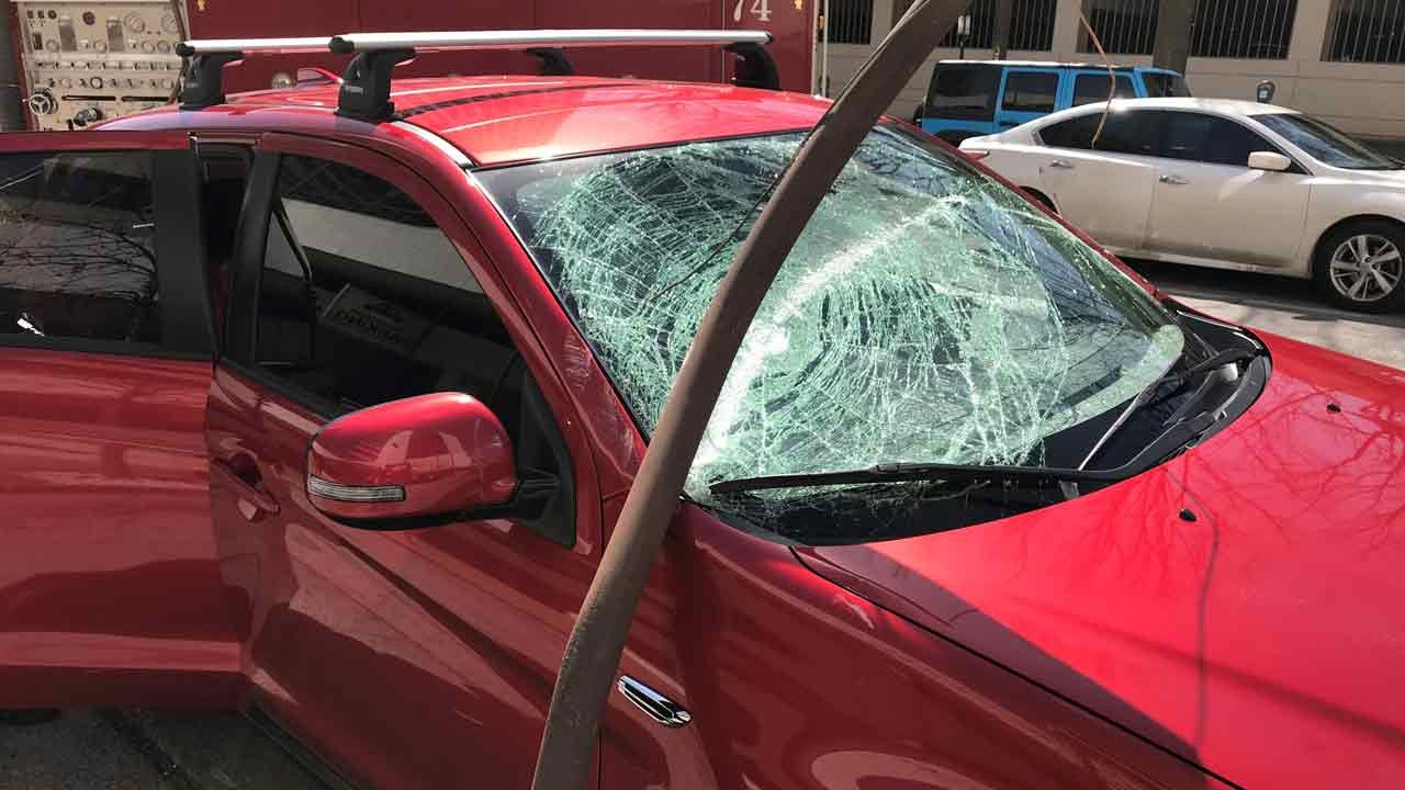 Wind Blows Pole Onto Car In Downtown Tulsa