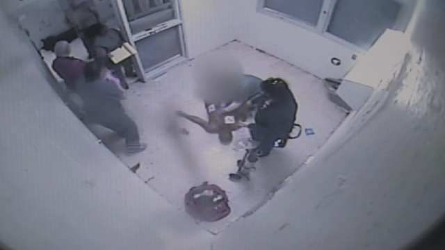 Medical personnel work to revive Williams after he is found unresponsive in his cell...