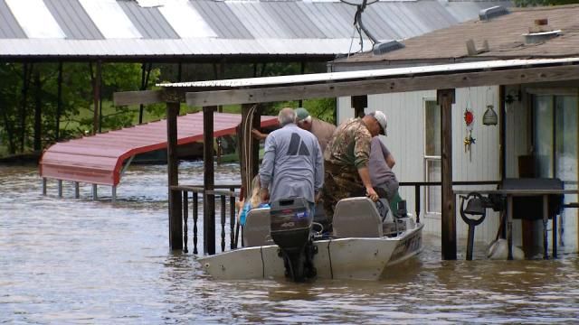 Okemah Family Wades Through Flooded Home To Salvage History
