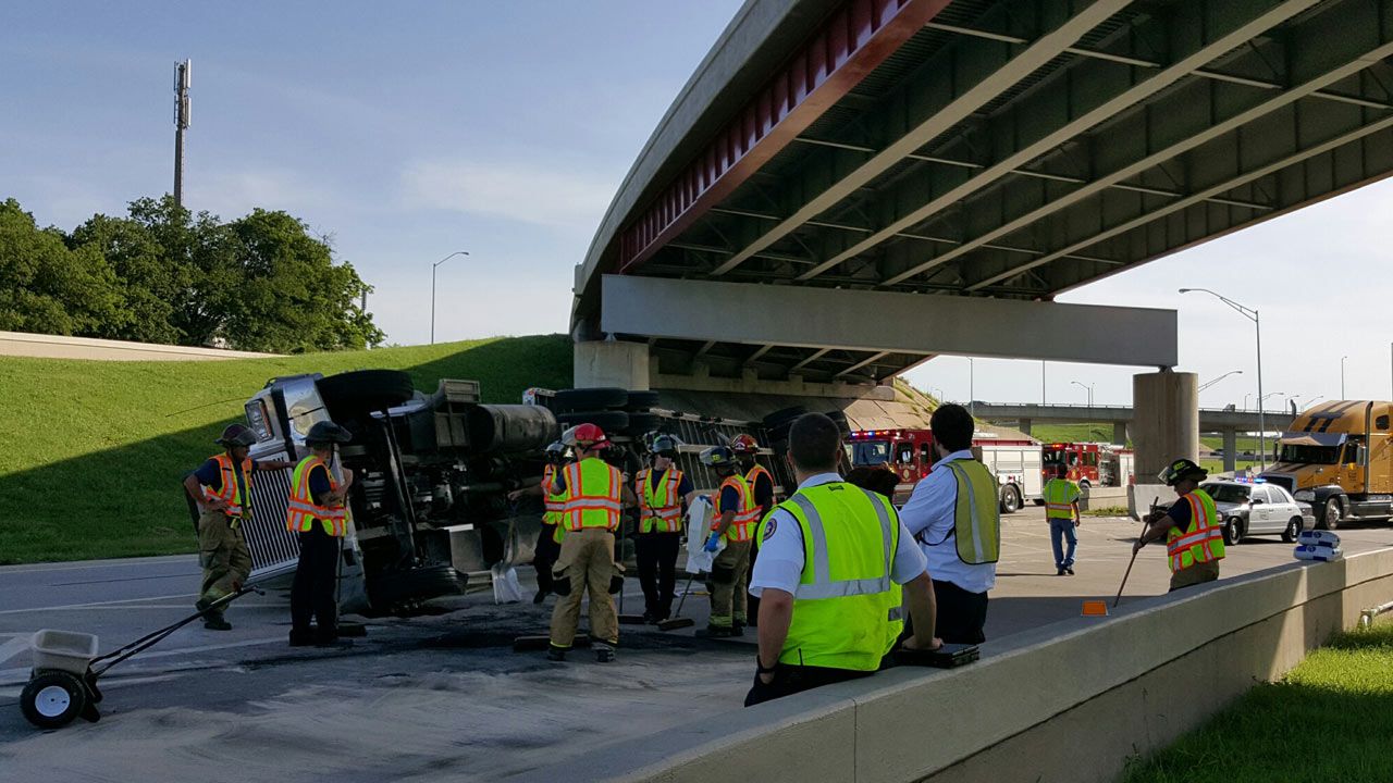 Semi Loaded With Steel Rolls Onto Side On Downtown Tulsa Highway