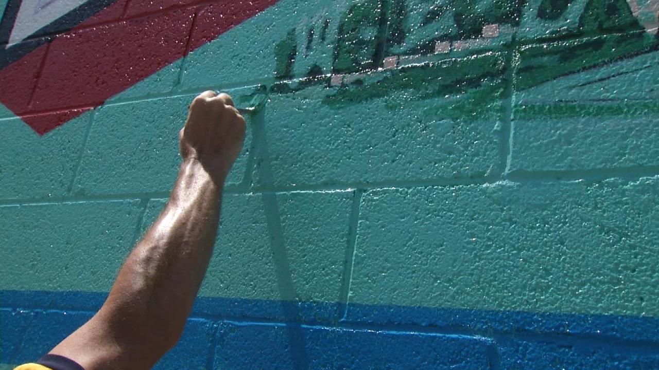 Mural Artist Adds More Flavor To Brady District