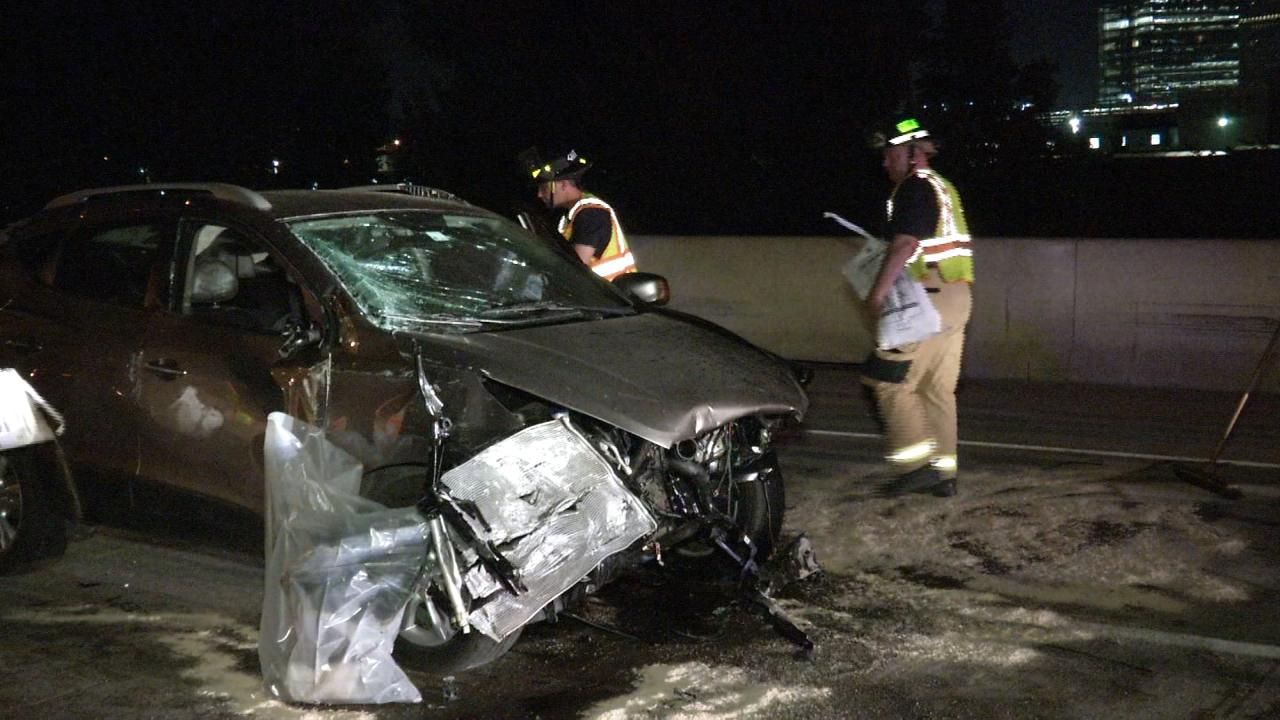Tulsa Firefighters Clean Up After Car Crashes Into Concrete Barrier