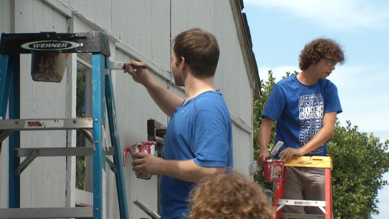 Group Bikes Across America, Stops In Tulsa To Help Senior Citizen Paint His Home