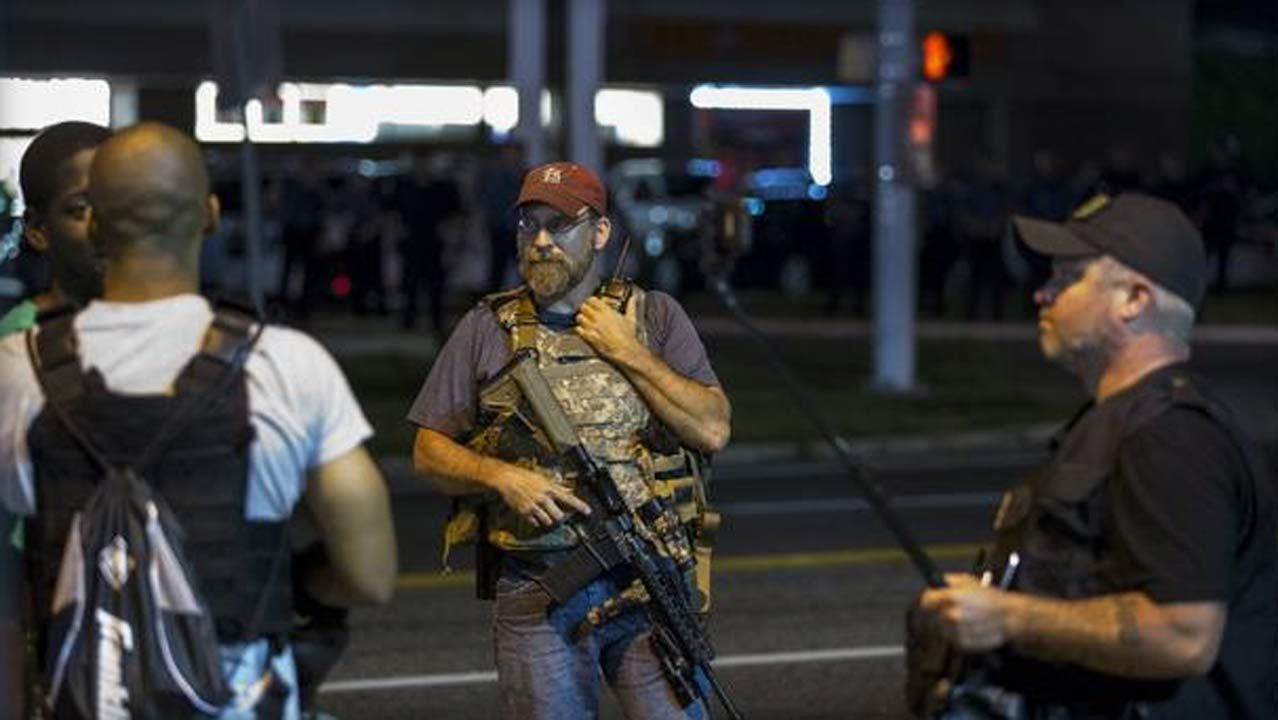 'Oath Keepers' Militia Members On Patrol In Ferguson