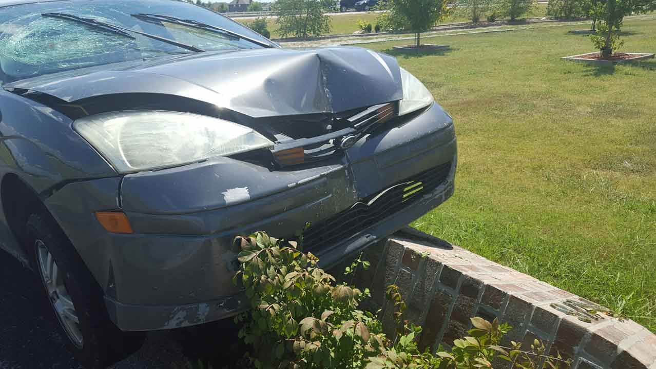 Collinsville Family Surprised By Car Stuck On Mailbox