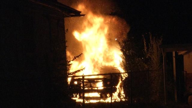 Fire Destroys Car Parked Behind Tulsa Home