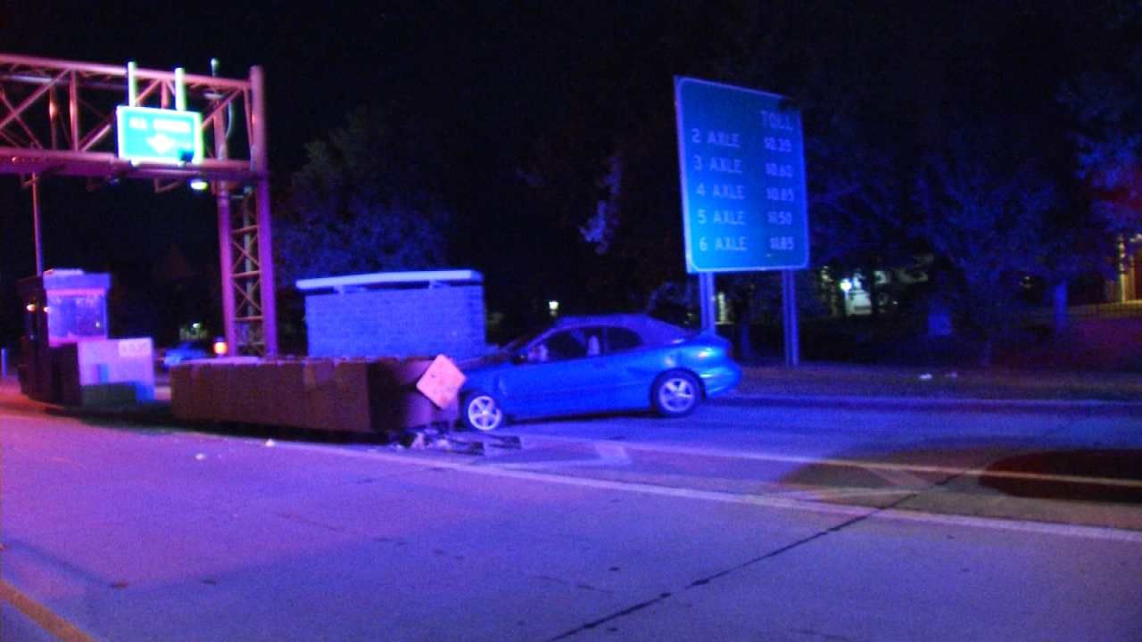Woman Crashes Car At Creek Turnpike Toll Booth