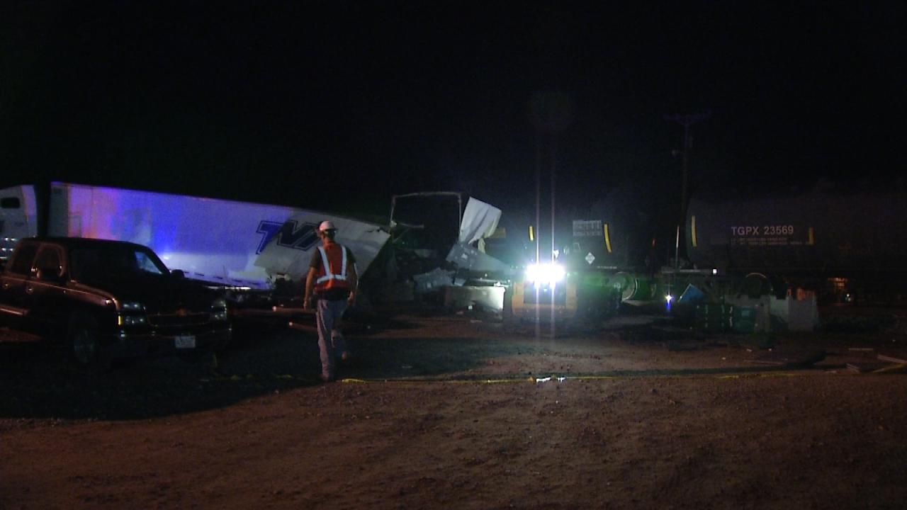 Locomotive Clips Semi Trailer At Mayes County Railroad Crossing