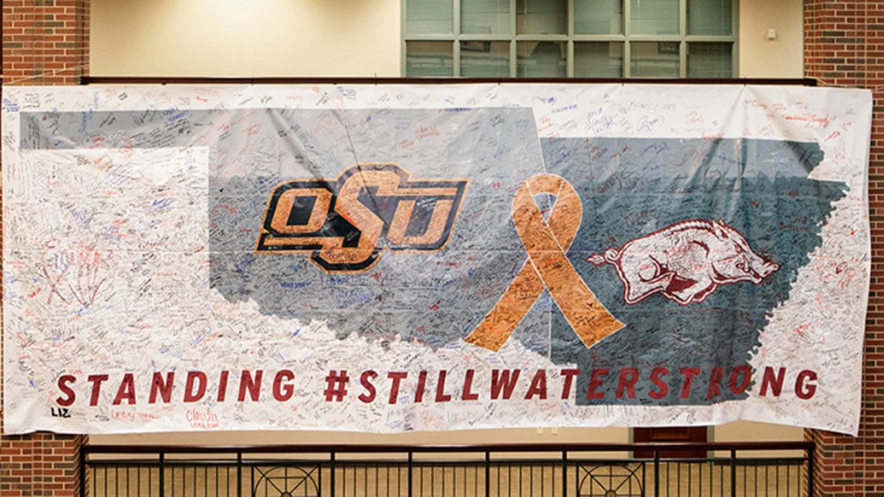 Banner Signed By Arkansas Students, Staff Presented To OSU