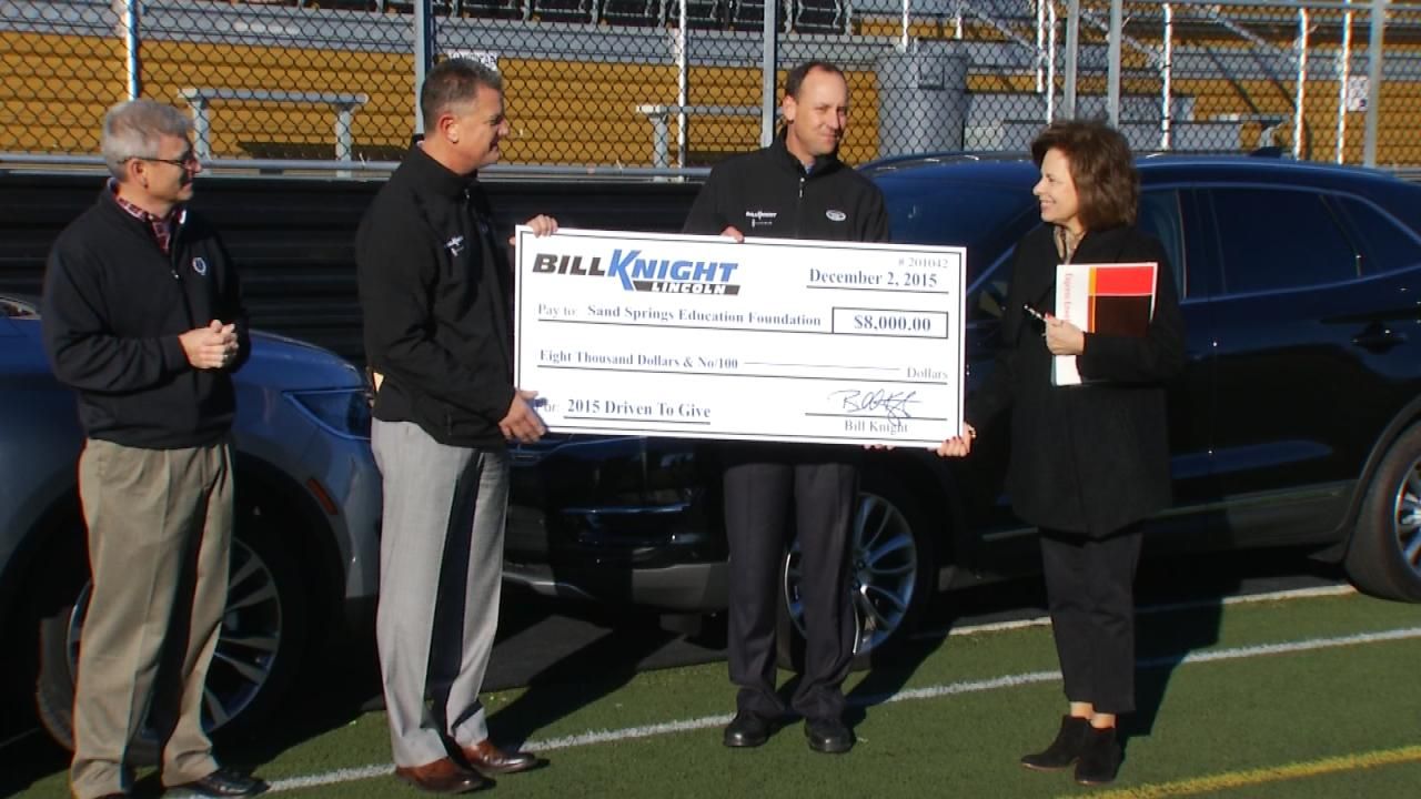 Sand Springs School Receives Check For $8,000