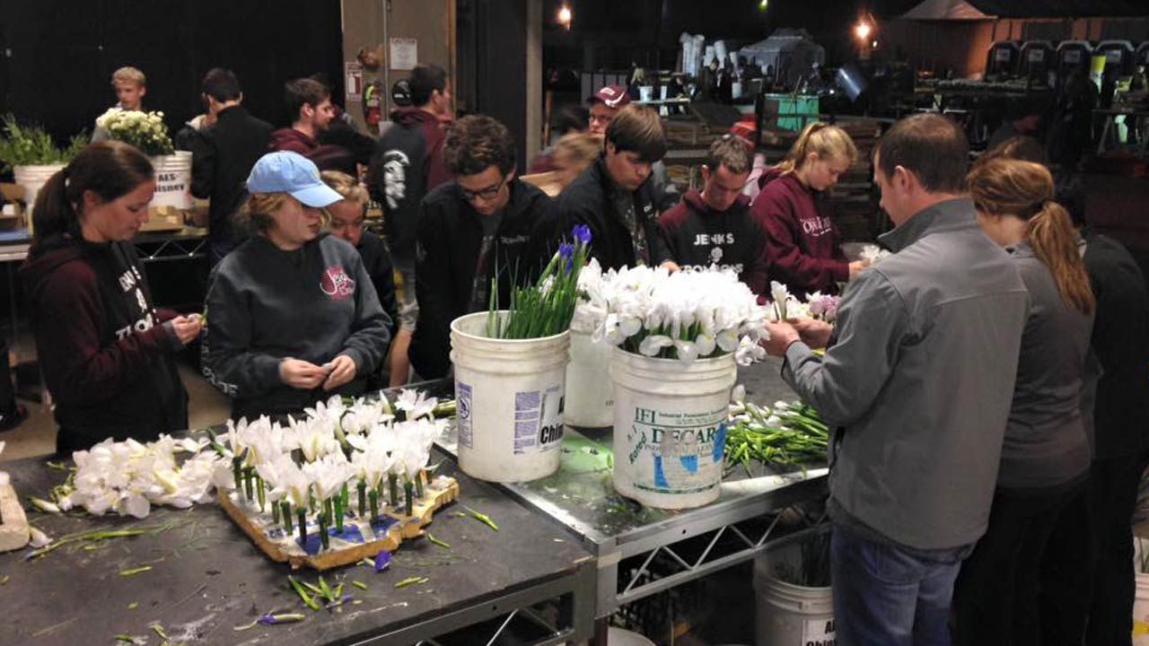 Jenks HS Band Helps Decorate Disney Float For Rose Bowl Parade