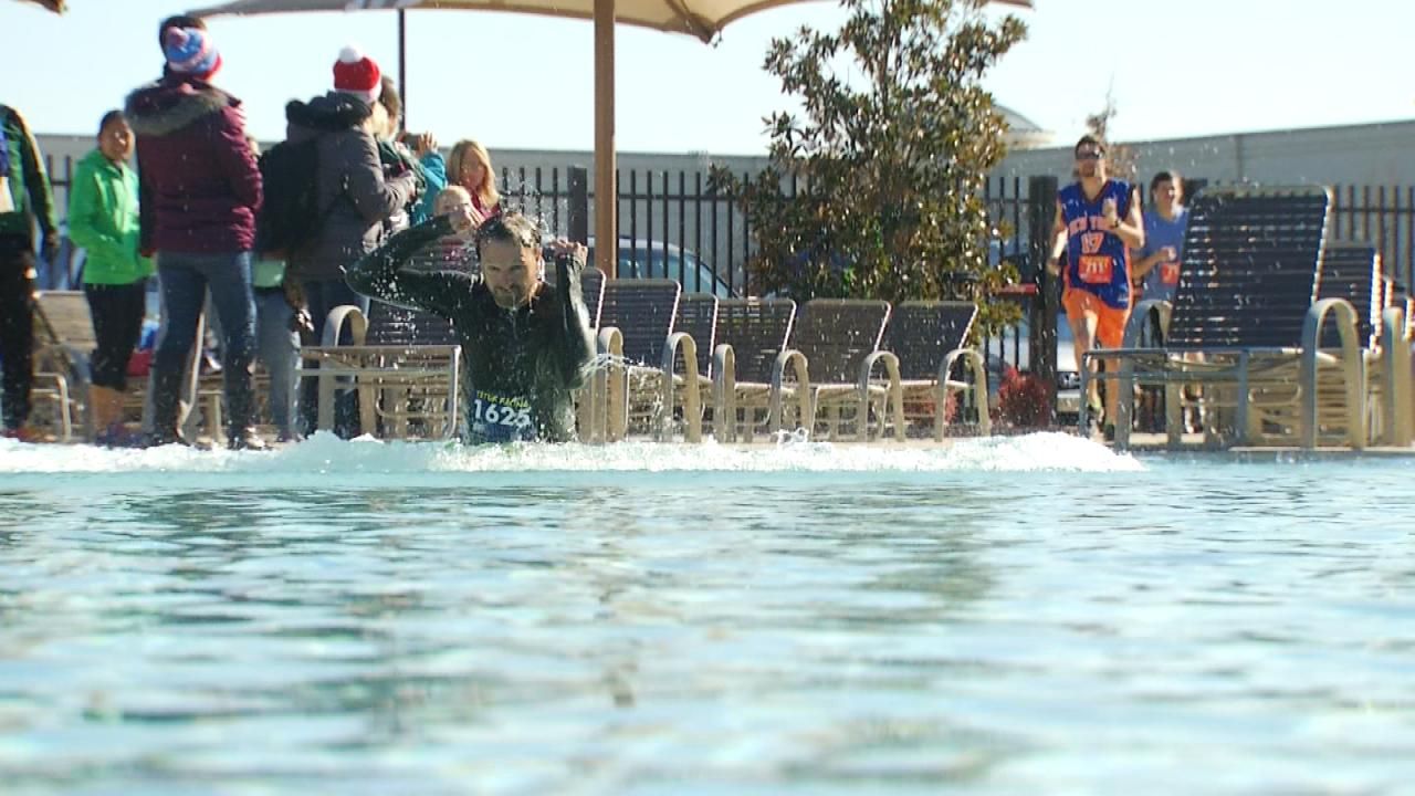 Tulsa Runners Turn Into Swimmers As They Plunge Into 2016